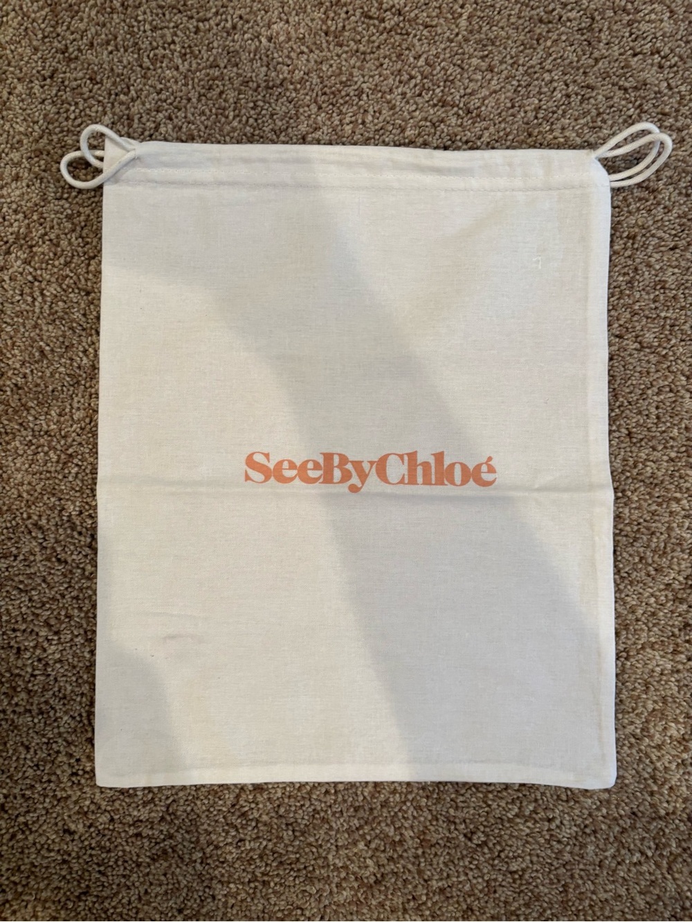 See By Chloe cream tote dust bag with peach logo